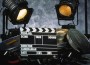 Clapperboard, film and two floodlights